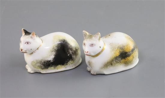 Two Derby porcelain figures of recumbent cats, c.1830, L. 6cm, one with hairline cracks